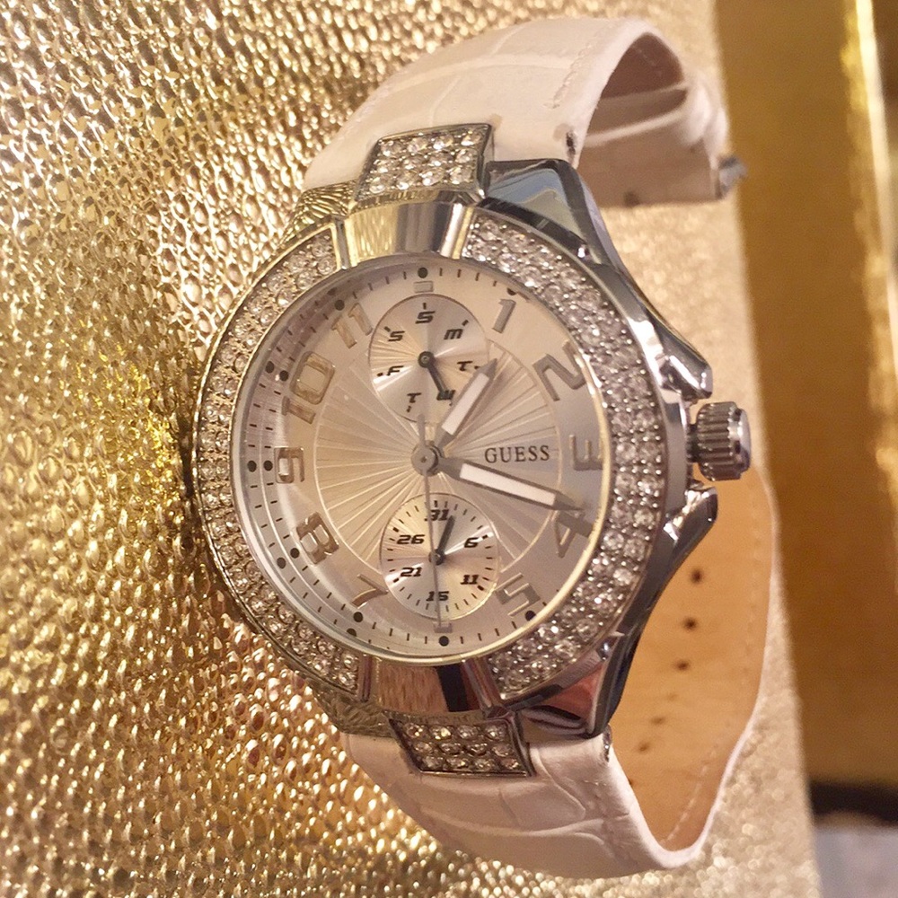 Women’s white guess watch